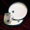 Dinnerware 
4 piece place setting includes dinner plate and a mug the other 2 pieces may be 2 bowls, 2 plates or combination $135 or choose a 
set of bowls or dessert plates 